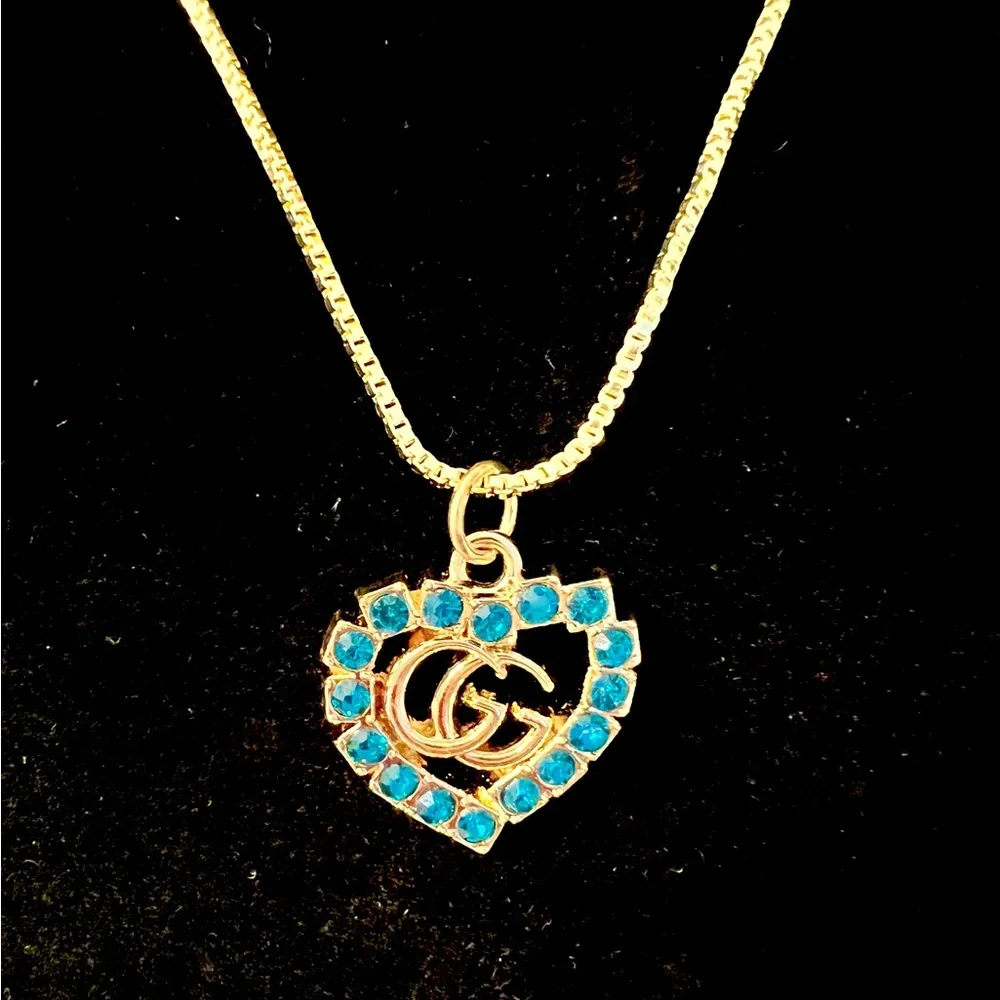 Authentic Gucci Gold and Turquoise Heart Charm with Necklace - Picture 5 of 6